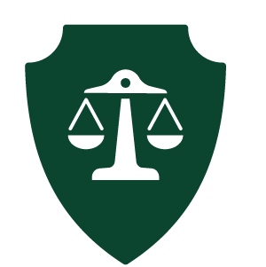 A dark green shield icon featuring a white balance scale (the scale of justice) in the center to symbolize integrity.